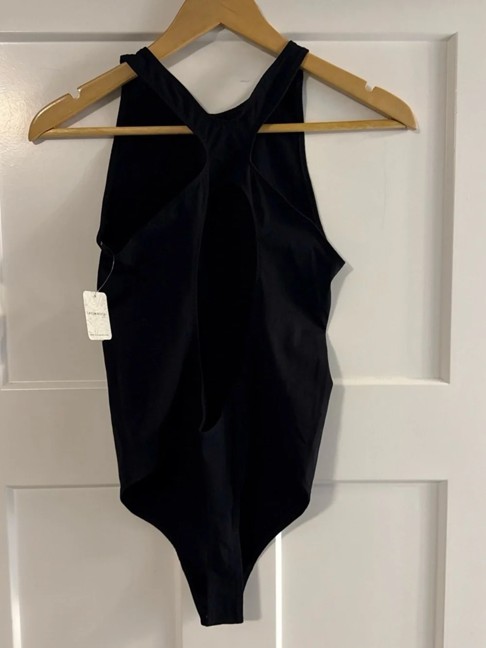 Free People Black Sleeveless One-Piece Bodysuit